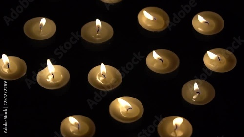 Wallpaper Mural Candles Slowmotion - Small Candles Burning On Black Background Torontodigital.ca