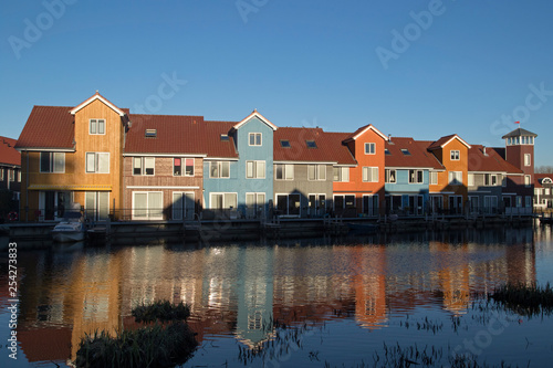Colourful waterfront houses at the Reitdiephaven (Reitdiep Marina) in Groningen, the Netherlands.