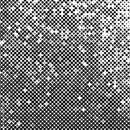 Abstract halftone background texture of black dots