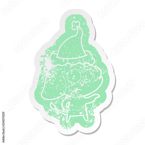 cartoon distressed sticker of a unsure elephant wearing santa hat