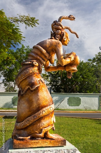 Ixchel or Ix Chel Statue of Jaguar Goddess in Ancient Maya Culture on Cozumel Waterfront photo