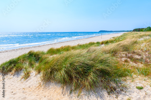 Fototapeta Naklejka Na Ścianę i Meble -  View of beach and sand dunes in Lobbe village, Ruegen island, Baltic Sea, Germany
