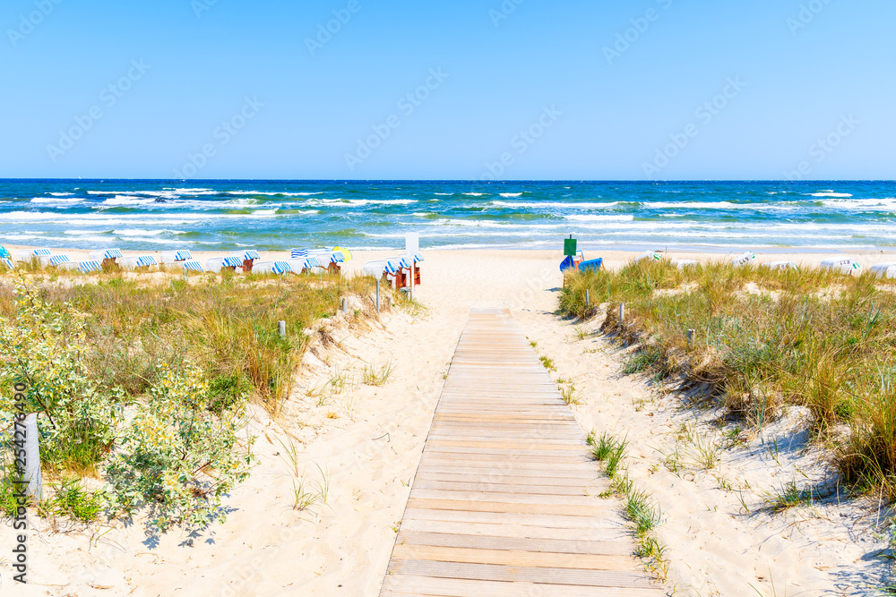 Path to sandy beach in Baabe village, Ruegen island, Baltic Sea, Germany.