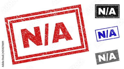 Grunge N/A rectangle stamp seals isolated on a white background. Rectangular seals with distress texture in red, blue, black and gray colors.