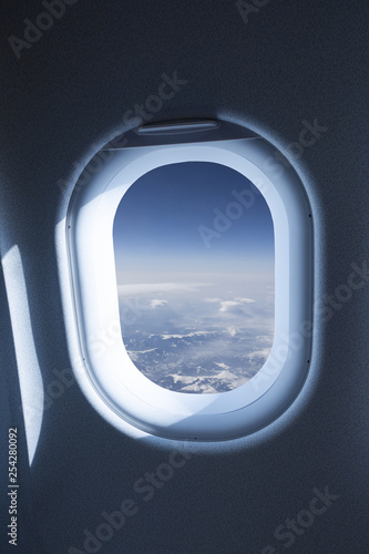 Looking through airplane window  