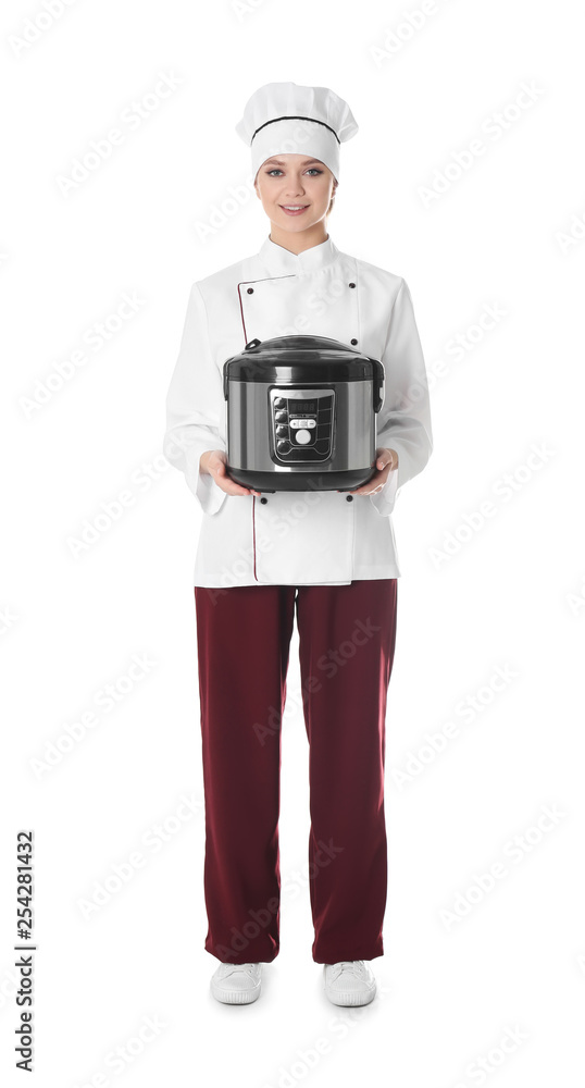 Full length portrait of female chef with modern multi cooker on white background Full length portrait of female chef with modern multi cooker on white background