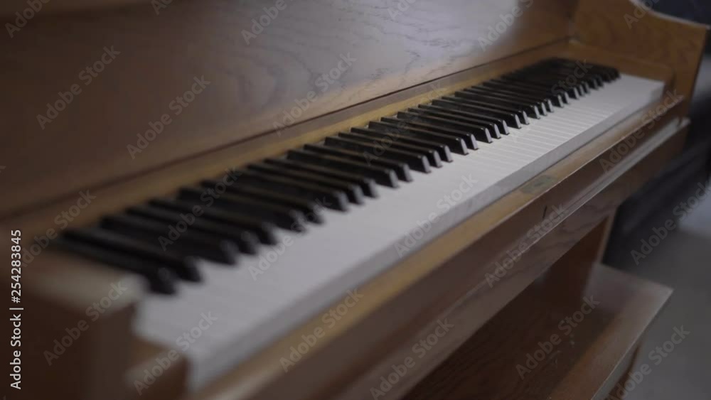 wooden stand up piano keyboard with a focus back and forth wooden stand up piano keyboard with a focus back and forth