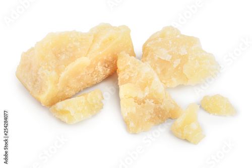 Parmesan cheese pieces isolated on white background. Closeup