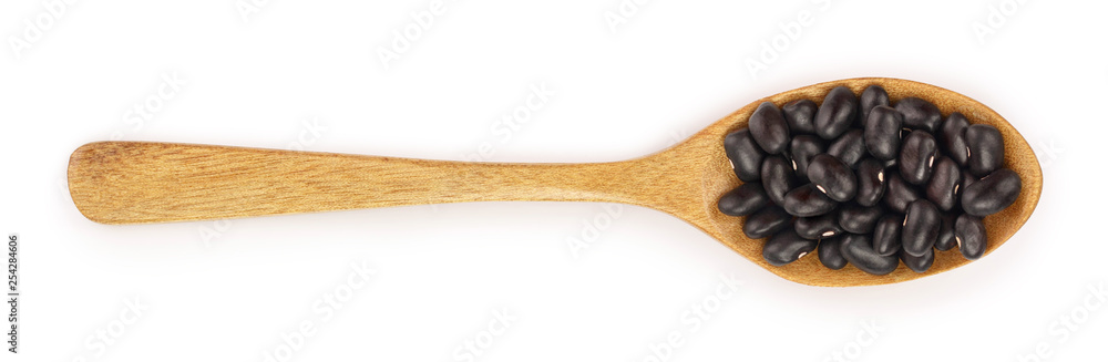 Obraz premium black kidney bean in wooden spoon isolated on white background. Top view. Flat lay