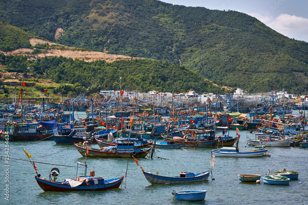 Beautiful landscape of sea bay with many fishing boats in Vietnam
