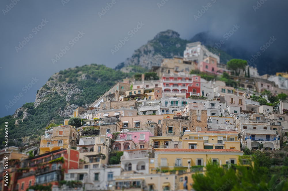 Tilt shift effect of Positano houses in a cloudy day