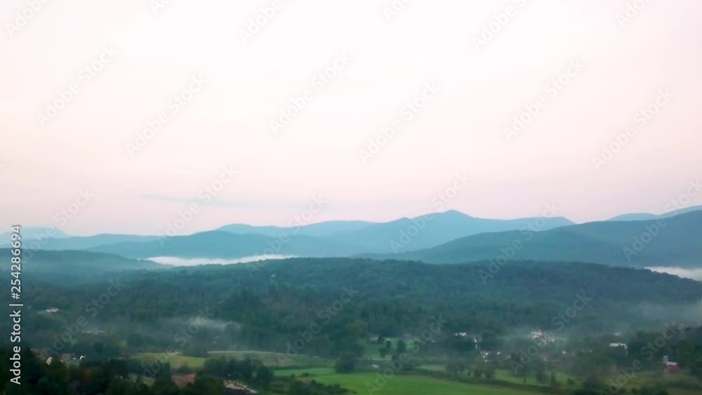 Vermont mountains and farmland at sunrise. Vermont mountains and farmland at sunrise.
