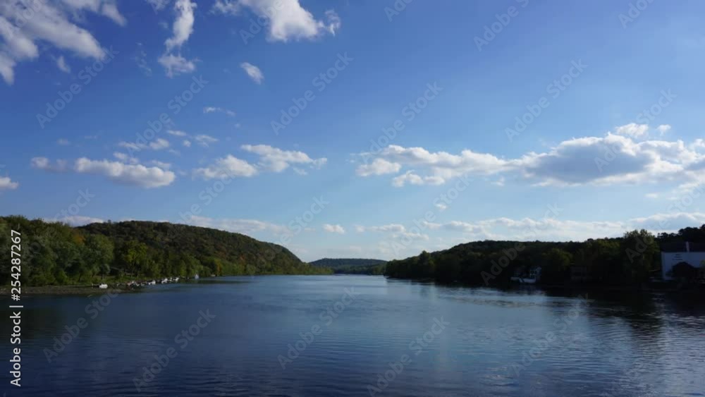 Time-lapsed shot of clouds and the Delaware River. Time-lapsed shot of clouds and the Delaware River.