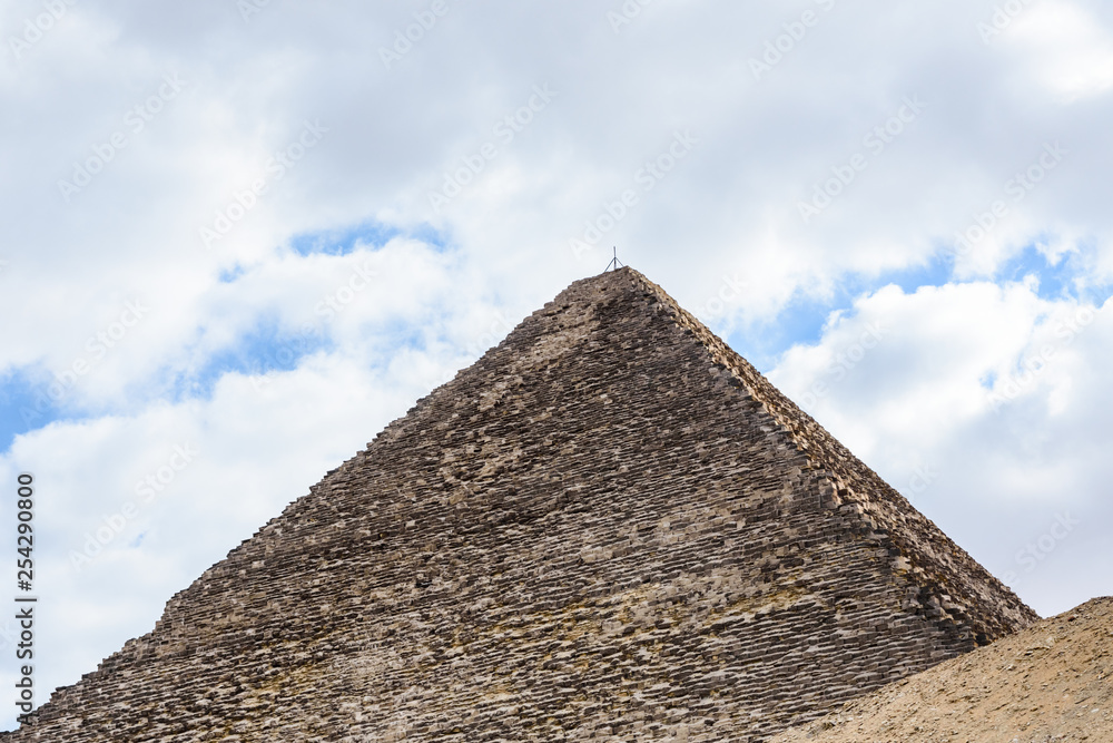The great pyramid of Cheops in Giza plateau. Cairo, Egypt The great pyramid of Cheops in Giza plateau. Cairo, Egypt
