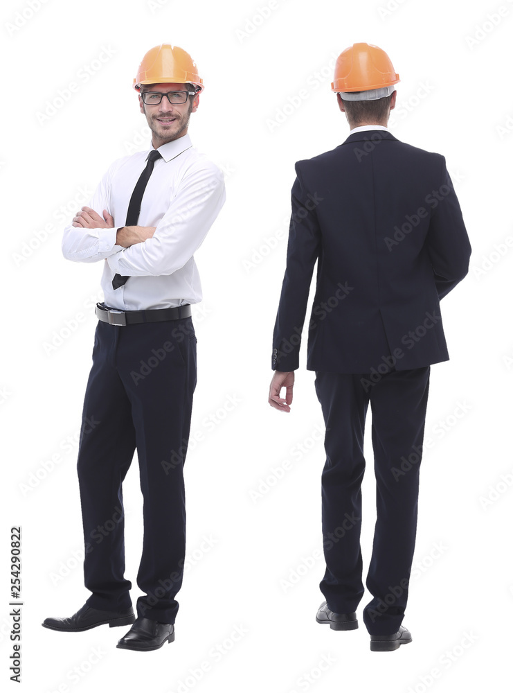 in full growth .successful architect engineer in orange helmet. in full growth .successful architect engineer in orange helmet.