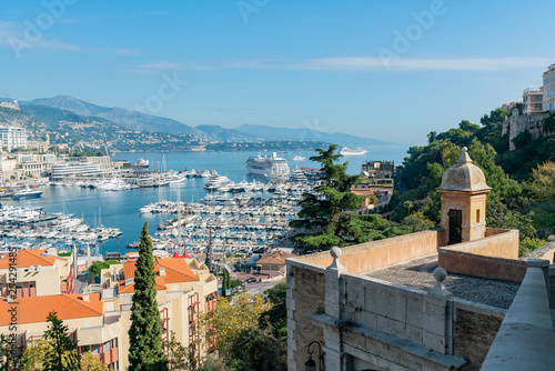 Aerial view of the Monaco cityscape with many ships