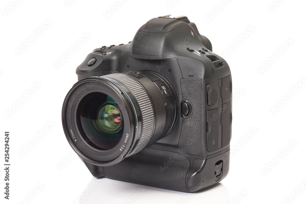 Fototapeta premium DSLR camera on a desk
