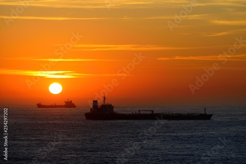 Cargo ships lying on roadstead at sunrise, Rio de Janeiro, Brazil, South America