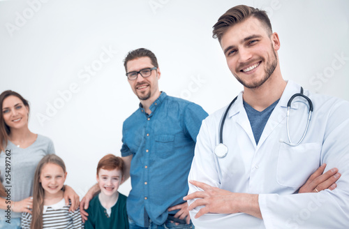 smiling family doctor and his patients