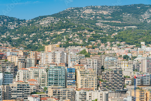 Aerial view of the Monaco cityscape with many residence and roof