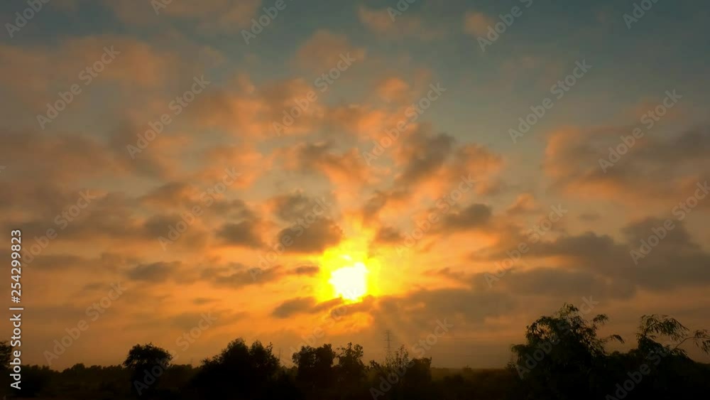 Beautiful scenic Sunrise with rays of sun shining through clouds Time lapse Beautiful scenic Sunrise with rays of sun shining through clouds Time lapse