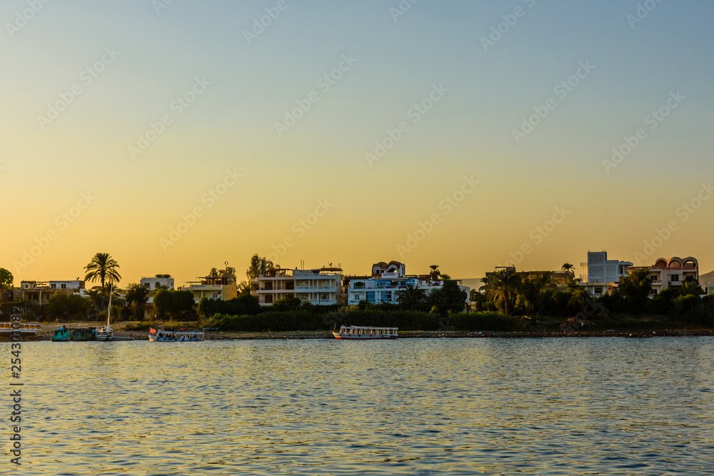 Residential buildings on a bank of the Nile river in Luxor, Egypt