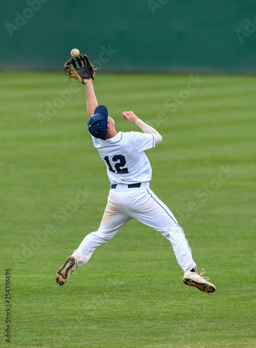 Young athletic boys playing baseball