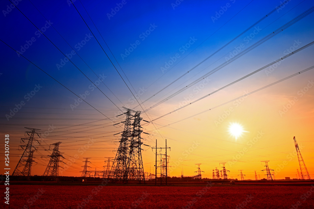 Electric tower, silhouette at sunset