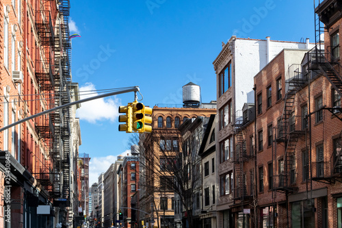 Photography Historic buildings along Spring Street on a bright sunny day in Manhattan, New Y