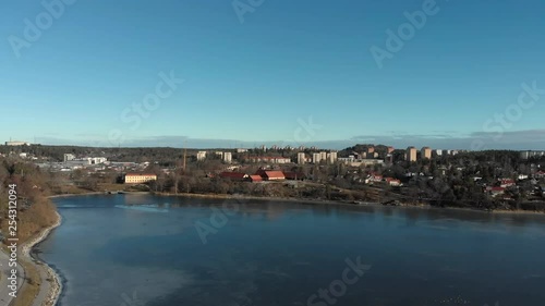 Wallpaper Mural Panning drone footage from Sollentuna  flying over a frozen bay of Stockholm archipelago with the Edsbergs castle in the background. Filmed in realtime at 4k. Torontodigital.ca