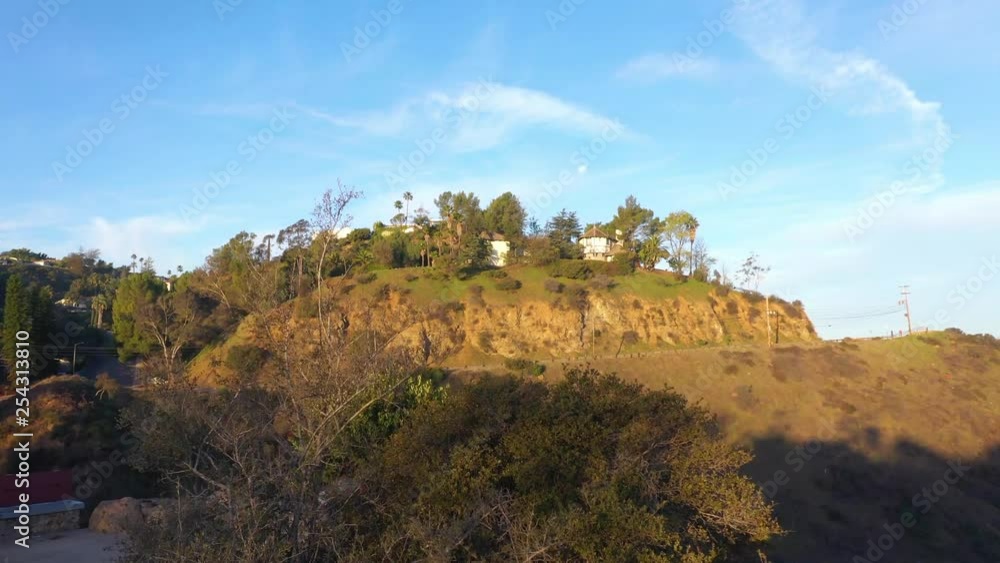 Golden hour at Mulholland drive, Los Angeles, California. Beautiful drone shot overlooking the mountains. Golden hour at Mulholland drive, Los Angeles, California. Beautiful drone shot overlooking the mountains.
