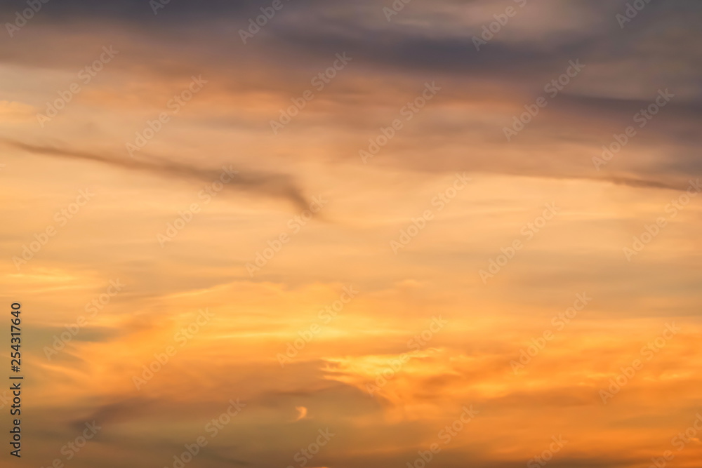 Beautiful stormy natural sunset sunrise sky. Cloudy abstract background, Sun Over Skyline, Horizon. Warm Colours.