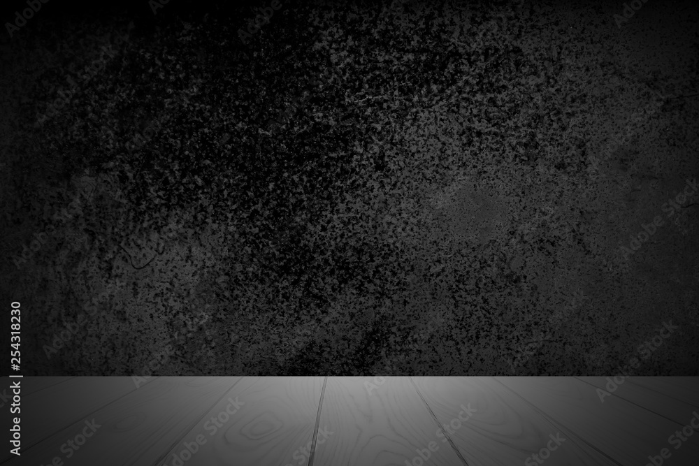 Empty wooden deck table over abstract black background with rough distressed aged texture for present product. Empty wooden deck table over abstract black background with rough distressed aged texture for present product.
