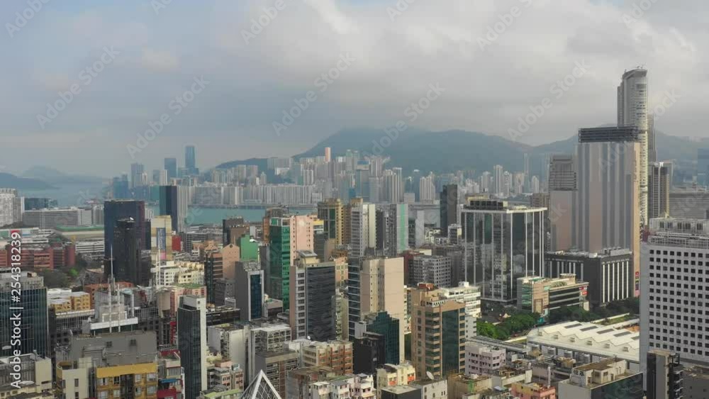sunny day flight over kowloon cityscape aerial hong kong panorama 4k sunny day flight over kowloon cityscape aerial hong kong panorama 4k
