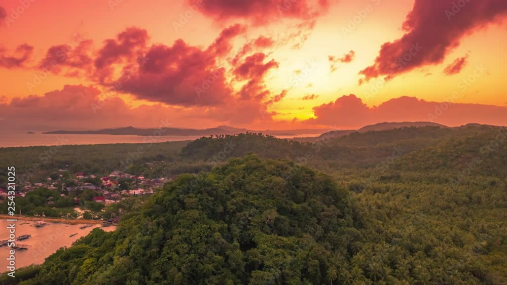 Sunset overlooking the mountain and mangrove jungle on the Siargao island, Philippines. Aerial Drone Timelapse 4K Sunset overlooking the mountain and mangrove jungle on the Siargao island, Philippines. Aerial Drone Timelapse 4K