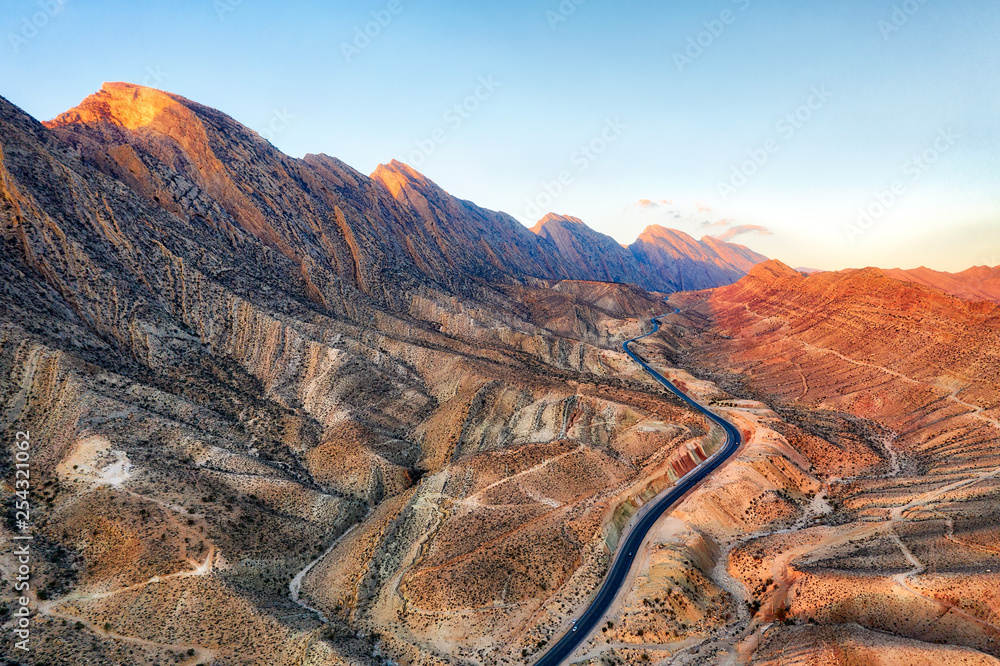 Road through the Zagros Mountains in South Iran taken in January 2019 taken in hdr - obrazy, fototapety, plakaty 