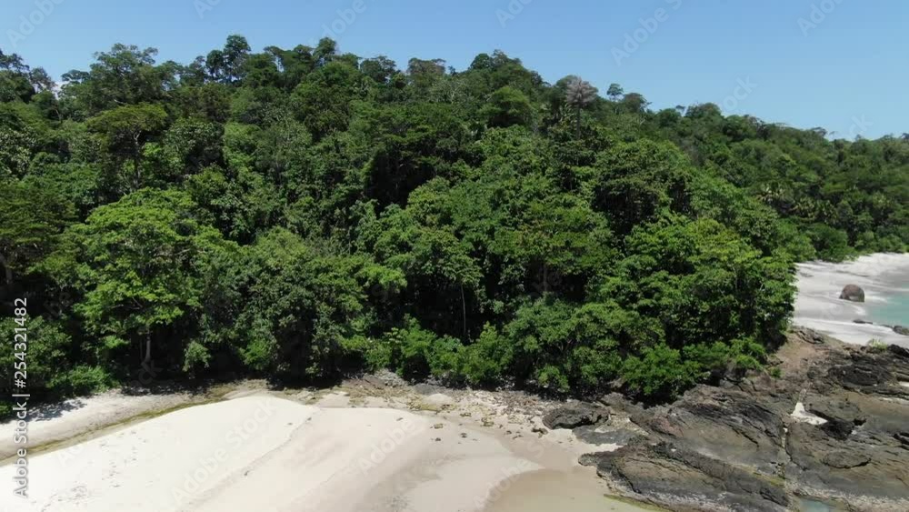 Aerial shot that follows the coast at Wedi Ireng beach in East Java Indonesia Aerial shot that follows the coast at Wedi Ireng beach in East Java Indonesia