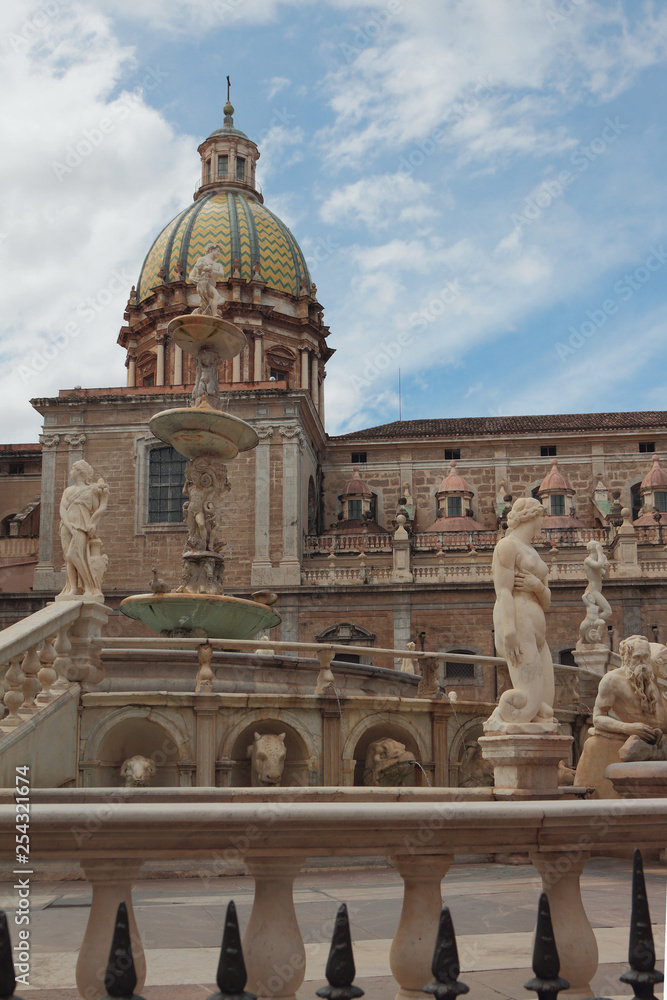 Fountain and church at Piazza Pretoria. Palermo, Sicily, Italy
