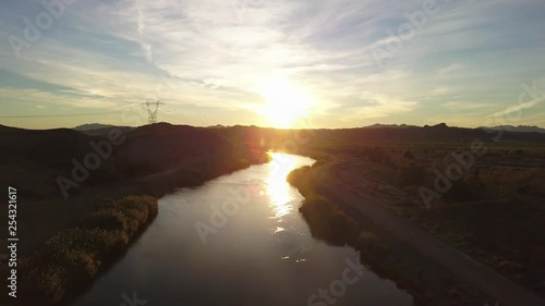 Aerial descent showing the all American Canal during golden hour.