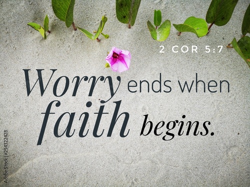 Worry ends when faith begins with bible verse design for Christianity with sandy beach background.