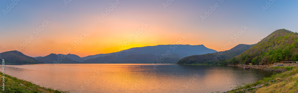 panorama Landscape of sunset on Mountain In the reservoir Sukhothai,Thailand panorama Landscape of sunset on Mountain In the reservoir Sukhothai,Thailand