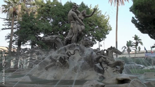 Full view slow motion pan of the fountain- Fontana Di Proserpina in Catania, Italy photo