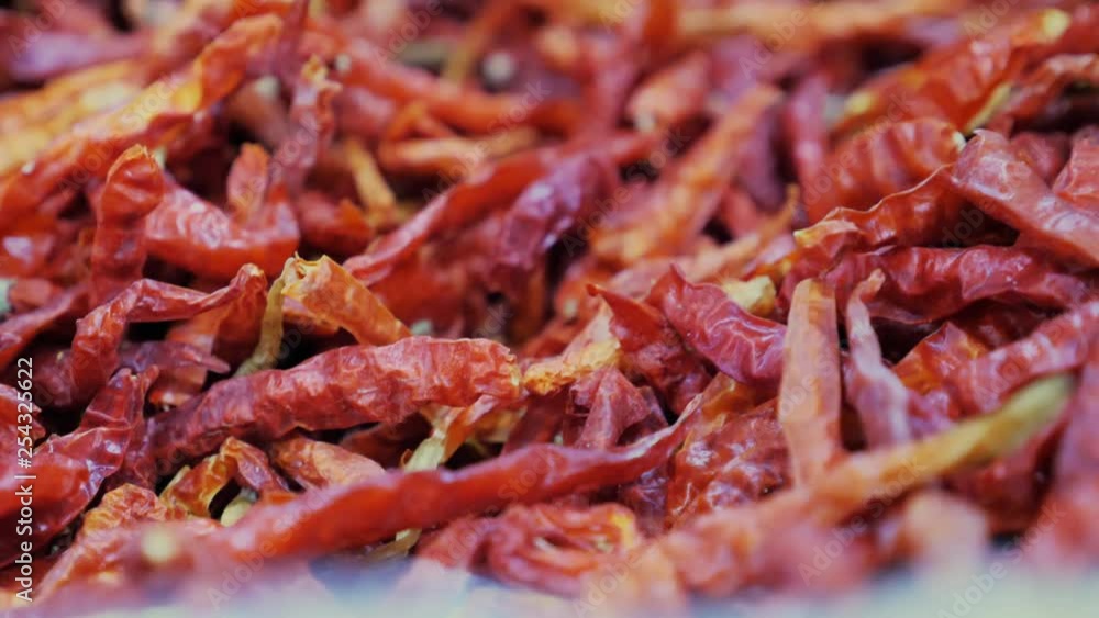 close up of dried Thai chilies in market stall in natural daylight situation, locked shot with slight breathing close up of dried Thai chilies in market stall in natural daylight situation, locked shot with slight breathing