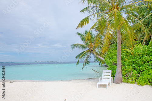 The island the beach with white sand and turquoise water a recreation area Maldives