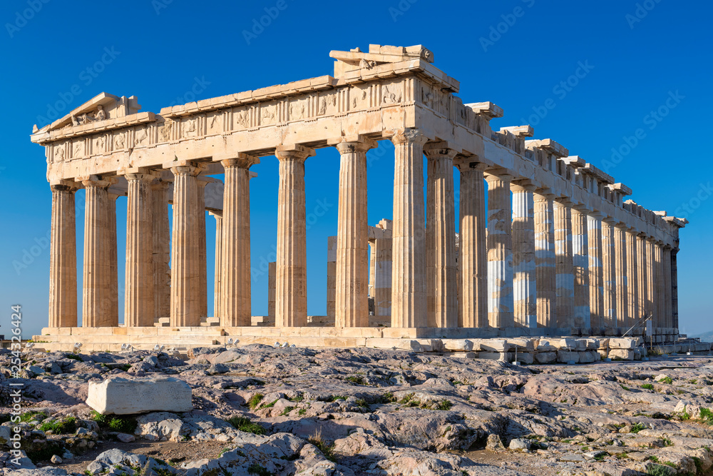Parthenon temple at morning time with blue sky in the background, Acropolis, Athens, Greece. 