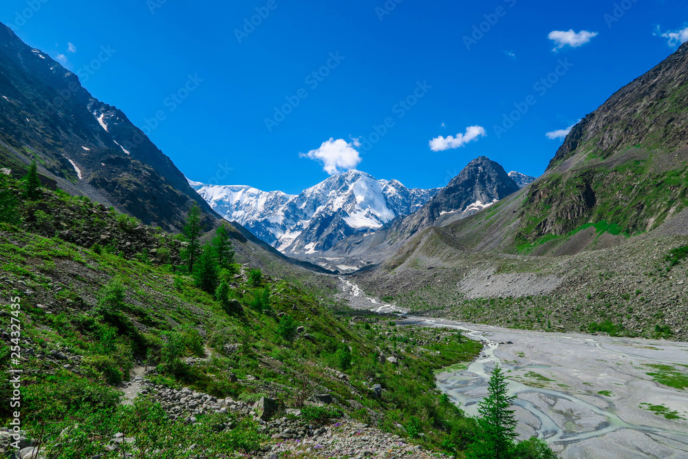 Akkem glacier river and mountains view. Summer in Altai mountains Akkem glacier river and mountains view. Summer in Altai mountains
