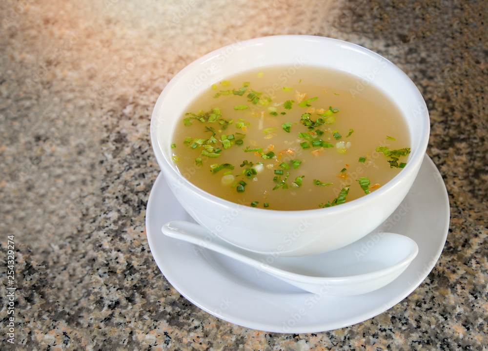 Mush morning breakfast bowl on table made from rice to boil - Traditional chinese style food Mush morning breakfast bowl on table made from rice to boil - Traditional chinese style food