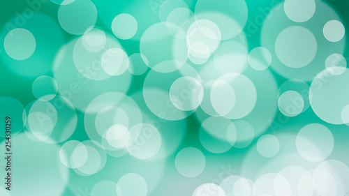 Abstract bokeh texture. White circles on the green background