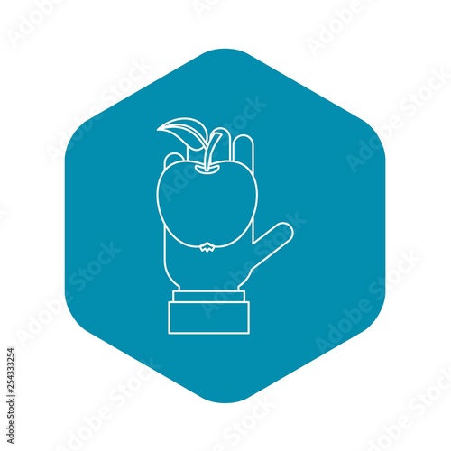 Apple in hand icon. Outline illustration of apple in hand vector icon for web design