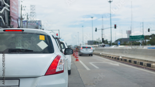 car on road traffic jam with blank sign sticker on back for design your text © sutichak